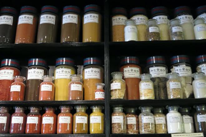Ochre pigments (left shelves) and a selection of paint additives and resins (right shelves) 